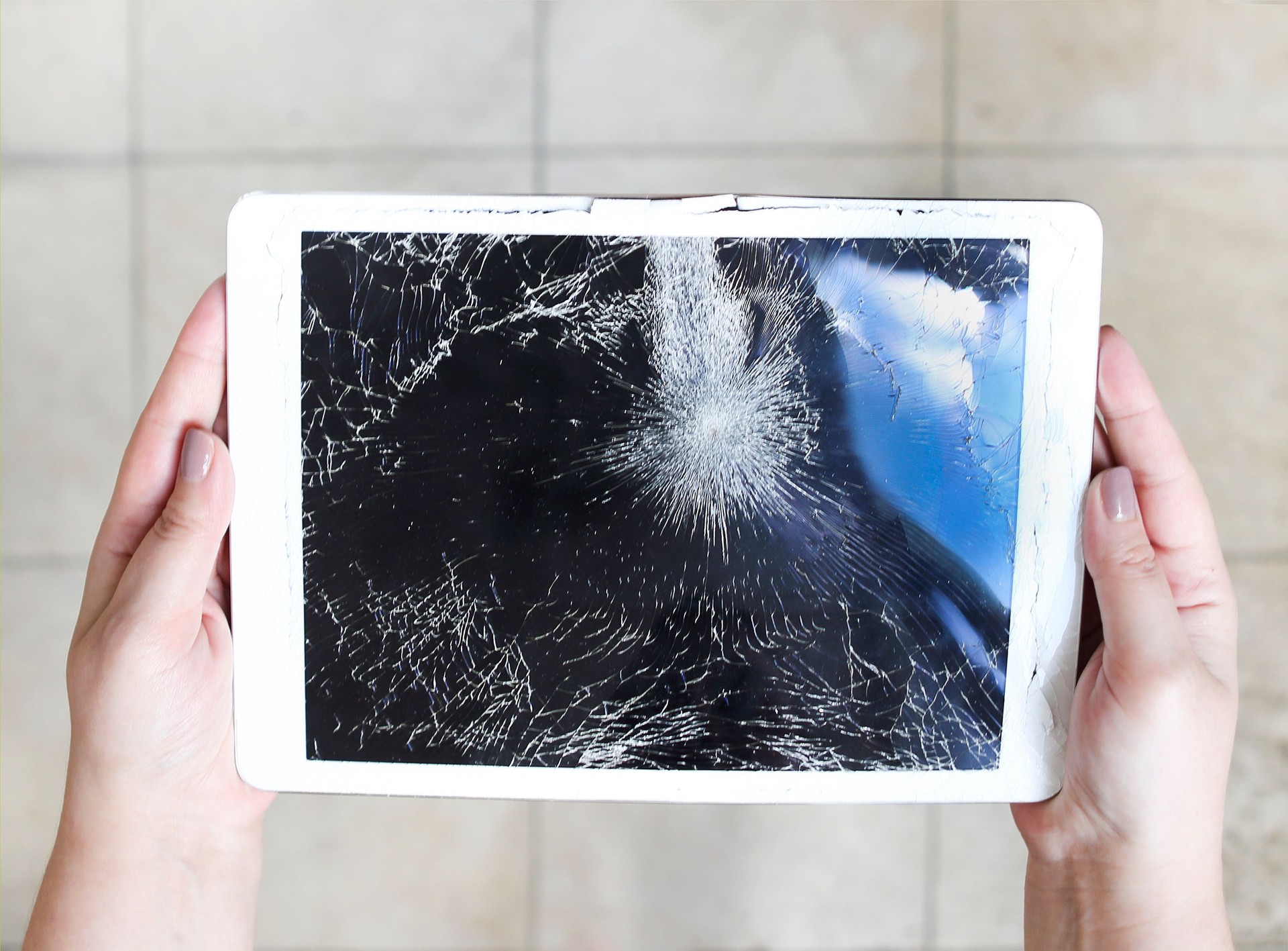 Damaged tablet computer lcd display on the floor